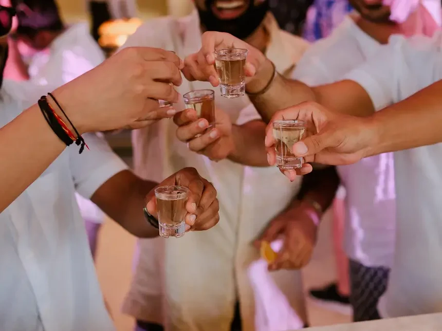 Indian wedding venue in Bali featuring guests celebrating together during a traditional wedding ceremony, with DMC Bali event support