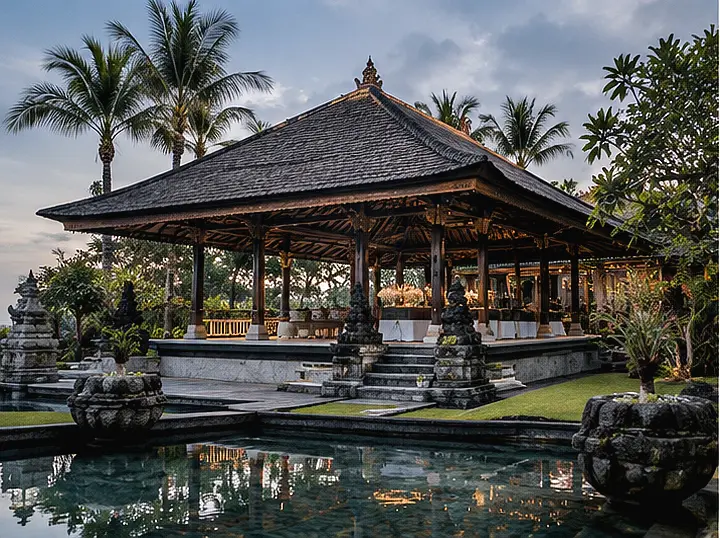 Traditional Bali bale pavilion beside a reflecting pool, a common corporate event venue setting in Bali